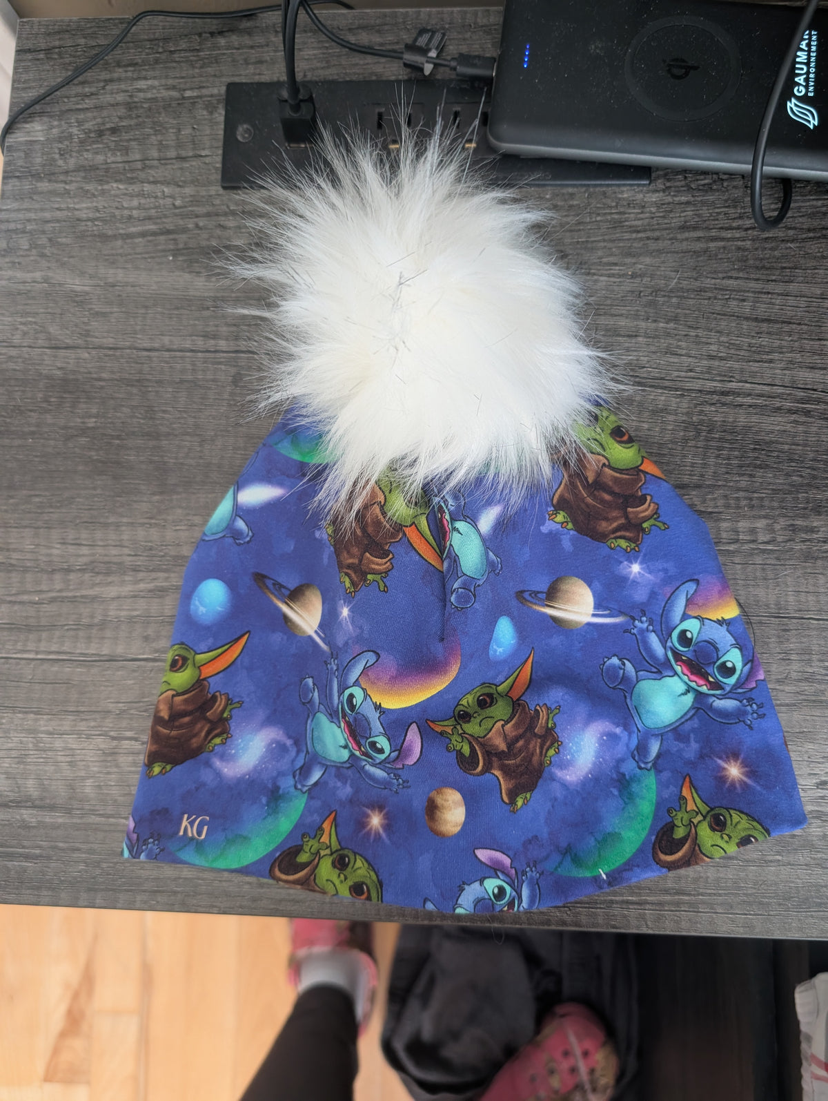 Tuque à motif personnage espace