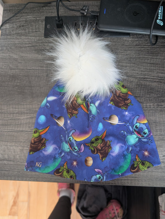 Tuque à motif personnage espace